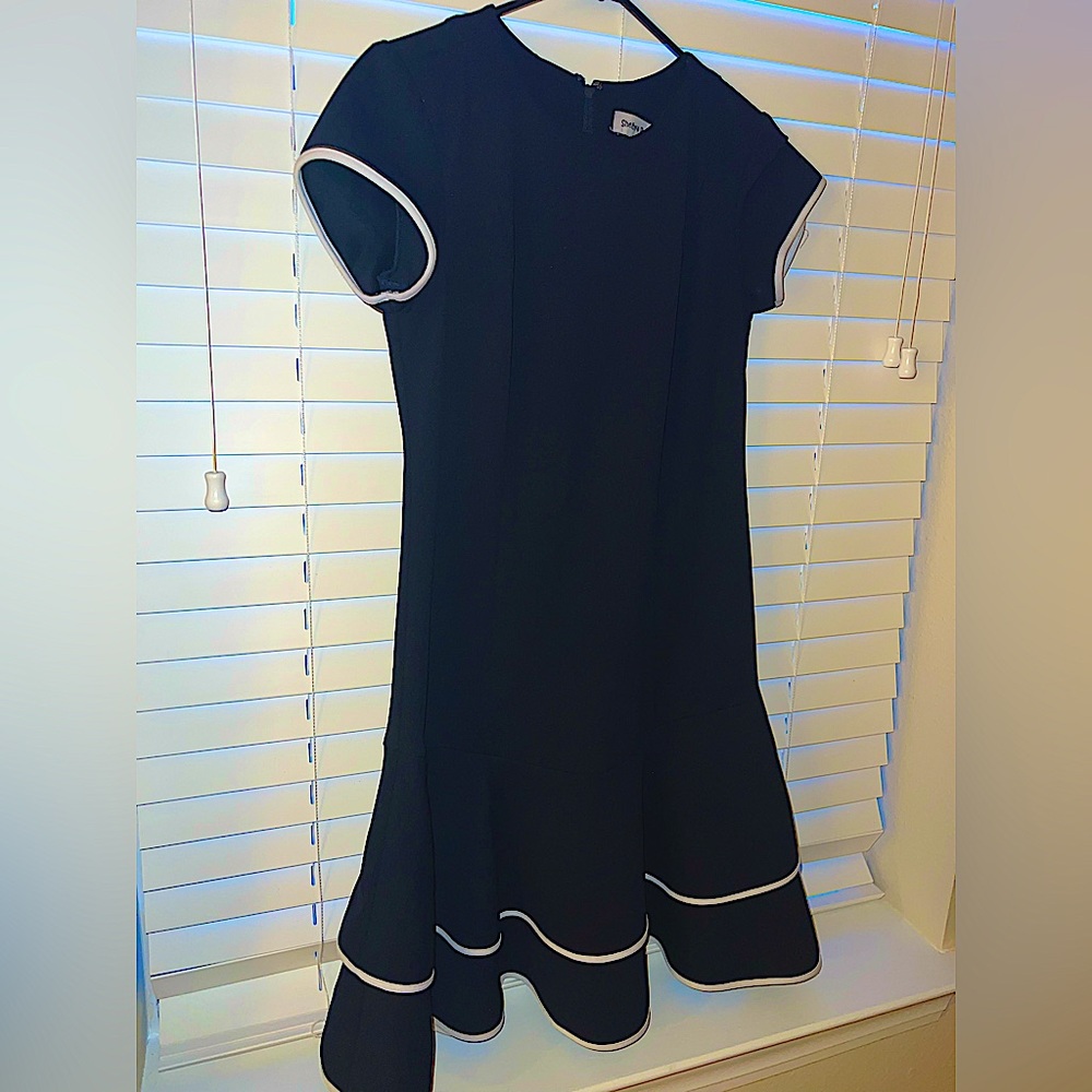 Cute blue dress with white double ruffle hem.